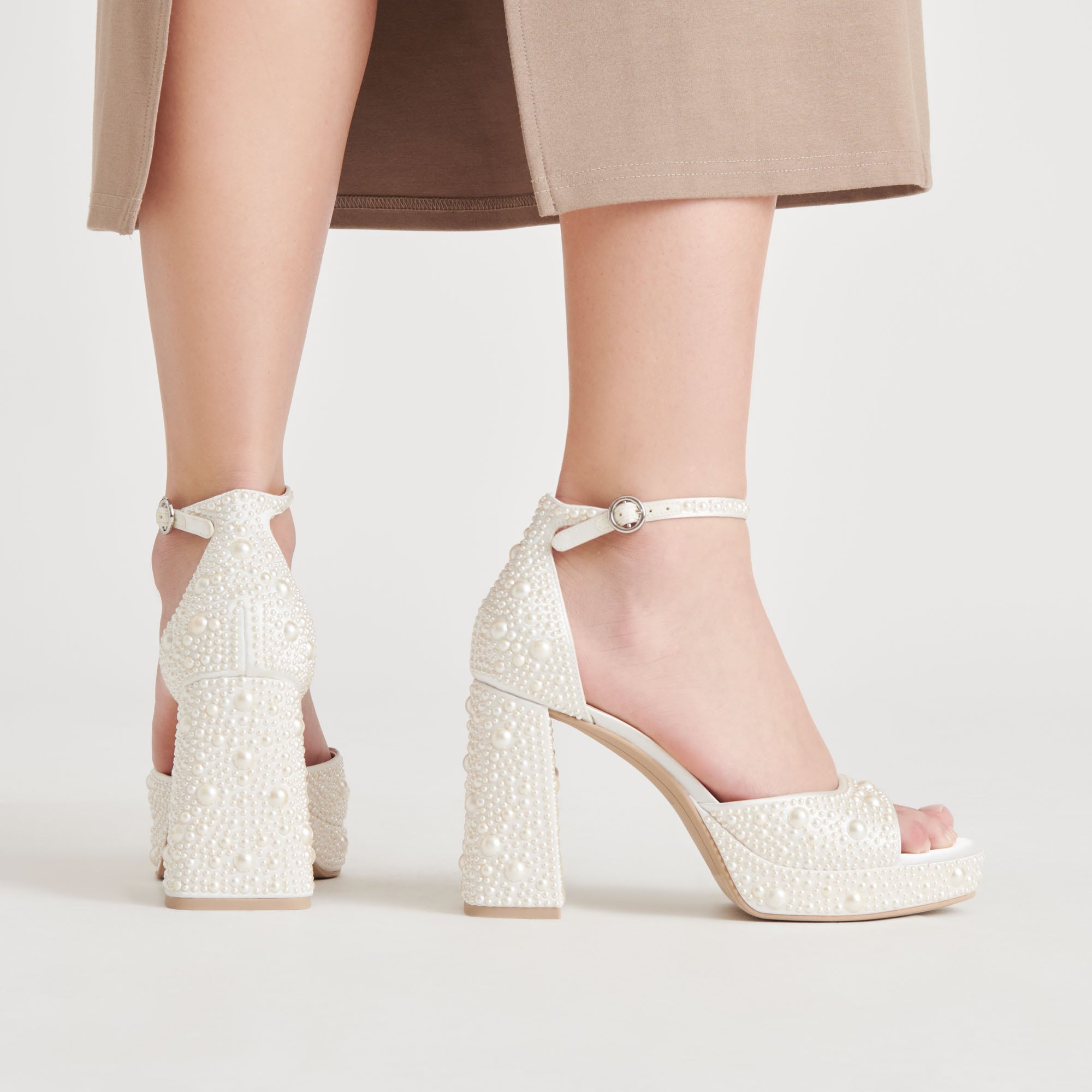 DOLCEVITA-HEELS_PANDROPEARL_TRUEWHITESATIN_ONFOOT_03-1_734ac3d5-8871-4b21-8f5e-cab2e18ec968-1.jpg